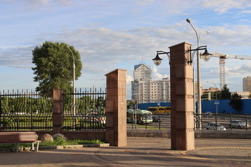 park zone with arch and bench in Minsk