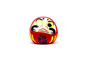 Daruma doll japanese symbolise on white isoled background.