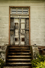 old abandoned door, house Duran sanatorium, mysterious and lonely place