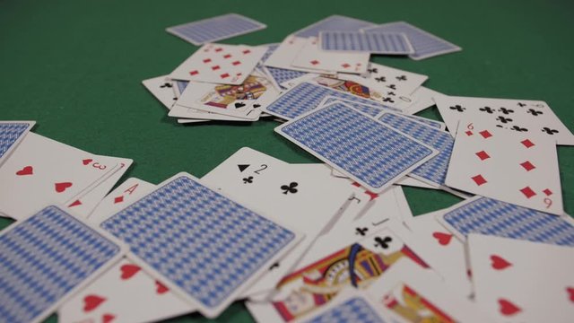 deck of cards  falling down