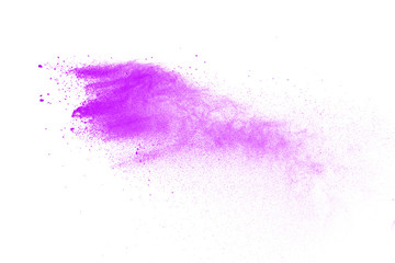 Fototapeta na wymiar Explosion of purple powder isolated on white background. 