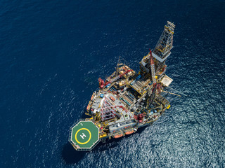 Aerial view from a drone of an offshore jack up rig at the offshore location during day time