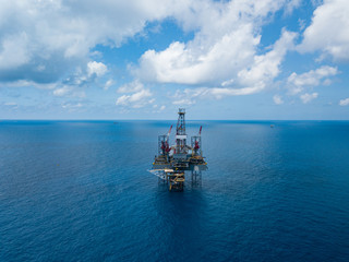 Aerial view from a drone of an offshore jack up rig at the offshore location during day time