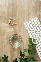 Taking medication at work. Take medicine at the desk.　仕事中の薬の服用。デスクで薬を飲む。