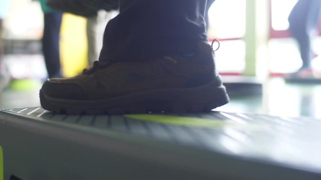 Feet On Bike Pedals For Exercise On Gym