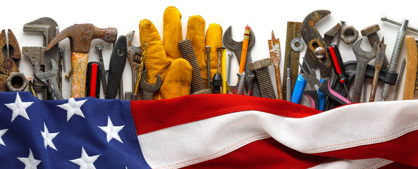 Patriotic collection of worn and used work tools with US American flag. Made in USA, American...