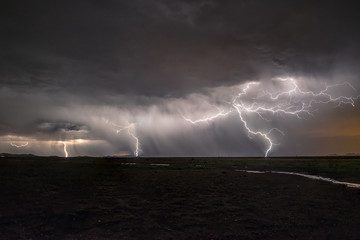 Naklejka na ściany i meble Monsoons over southern Arizona with lightening