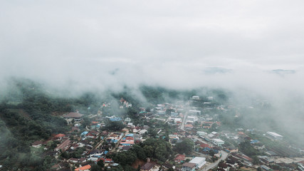 Aerial view foggy of the village at the north Chiang Rai, Thailand.