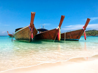 longtail boats for traveler  Andaman sea Thailand,  Tropical beach, Water travel Thailand, Summer holliday vacation trip.