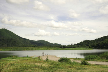 View of lake, mountain and blue sky.