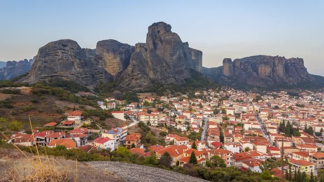 Footage 4k Timelapse of Incredible sunset view of Meteora rock formation and Activities in evening city of Kalabaka, UNESCO World Heritage since 1988, Meteora, City Kastraki, Greece.