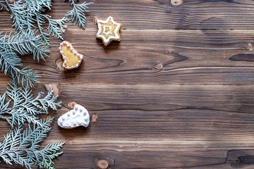Christmas decoration with cookies on wooden background for Christmas holidays, top view.