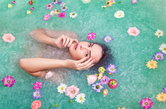 Young beautiful woman relaxes spa procerure
