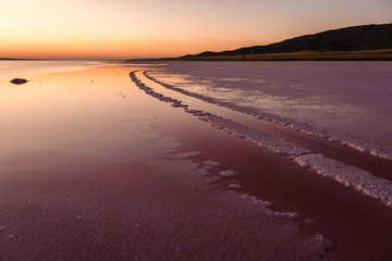 Summer sunset view with dried salt lake in Turkey