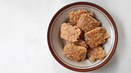 Tempe Goreng. Fried tempeh, or soybean cake, a side dish commonly served with Soto Batok and other Javanese meals.