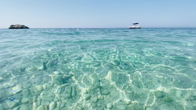 Transparent water stone sea bottom turquoise color tranquil seascape Albania Livadh beach