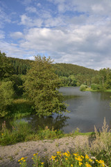 Fototapeta na wymiar Kronenburger See in der Eifel in Deutschland
