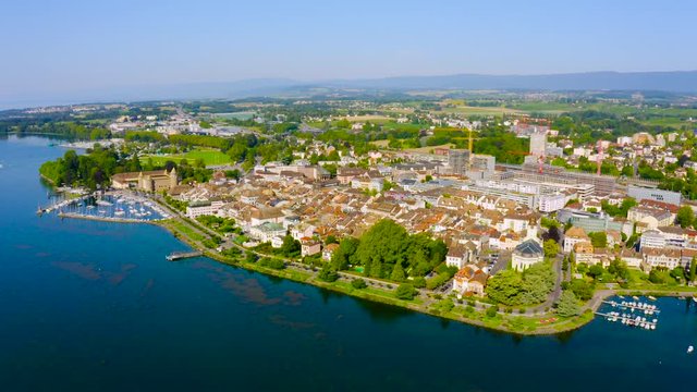 Beautiful Town Of Morges By The Lake Leman On A Bright Day In The Canton Of Vaud, Switzerland - aerial drone shot