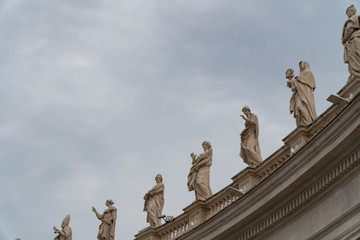 Detail of the statues and columns around St. Peters Square in Rome, Italy