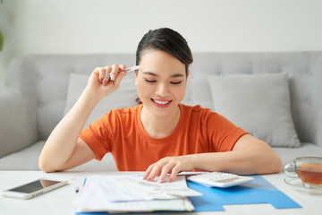 Young woman wife in budget planning concept