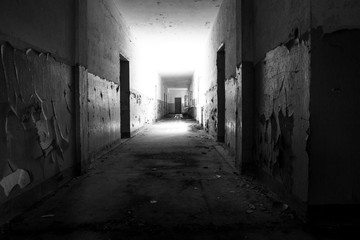 Dark corridor, mysterious and dangerous place in black and white