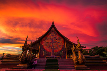 Fototapeta na wymiar blurred abstract background of the twilight sky in the evening at one of the beautiful tourist spots in Ubon Ratchathani(Wat Sirindhorn Wararam)WatPhuPhrao,tourists always come see the glowing church.