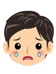 カーディガンを着た男子学生