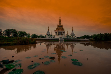 Fototapeta na wymiar The background of an important tourist attraction in Khon Kaen Province (Wat Thung Setthi) is a large pagoda in the middle of a swamp, tourists always come to see the beauty in Thailand