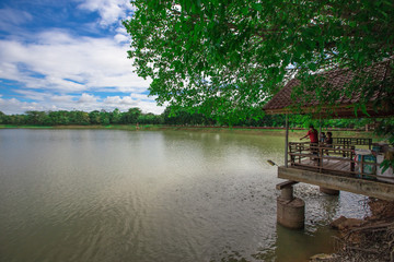 Phuttha Utthayan Wat Pa Dong Rai-Udon Thani:June 19,2020, the atmosphere inside a religious tourist site(Santi Wanaram Temple),a large lotus flower in the middle of the pool and a history in thailand.