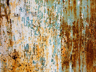 Creative bright metallic background. Flat background texture of dirty rusty metal. Bright rusty spots as the main background for a vintage scratched design