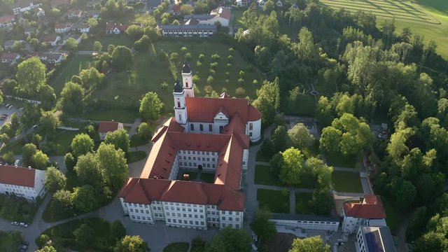 Aerial view flight at Benedictine monastery in Irsee, Diocese of Augsburg, Bavaria, Germany,