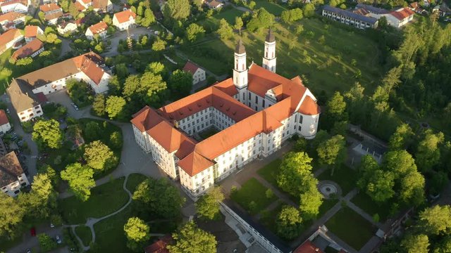 Aerial view flight at Benedictine monastery in Irsee, Diocese of Augsburg, Bavaria, Germany,