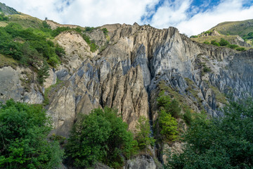 Fototapeta na wymiar Multicolored cliffs in Khevsureti mountains, landscape, Georgia