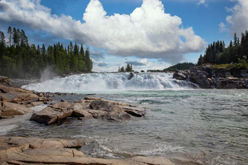 Large waterfall by the salmon river on Helgeland