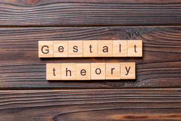 gestalt theory word written on wood block. gestalt theory text on cement table for your desing, concept - obrazy, fototapety, plakaty