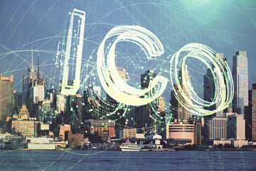 Double exposure of crypto currency theme hologram drawing and city veiw background. Concept of blockchain and bitcoin.