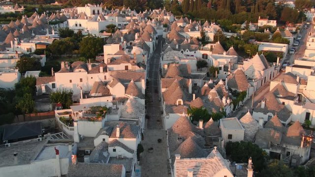 alberobello aerial view drone fly over trulli sunrise apulia italy