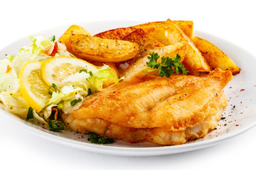 Fried fish with potatoes on white background
