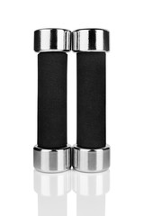 Two dumbbells on white background isolated close up with reflection, metal barbells set, pair of iron fitness bar-bells, sport equipment, bodybuilding concept, healthy lifestyle, gym training, nobody
