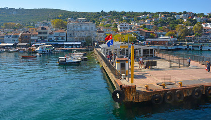 Fototapeta na wymiar The ferry station on Burgazada, one of the Princes' Islands, also known as Adalar, in the Sea of Marmara off the coast of Istanbul,
