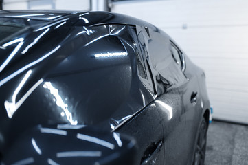 Fototapeta premium Tinting on side car windows, vehicle tuning