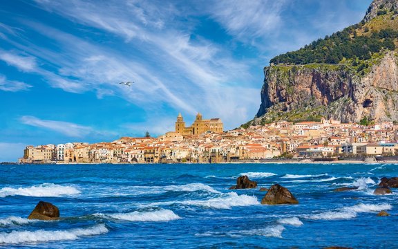 Blue sea near Cefalu, town in Italian Metropolitan City of Palermo located on Tyrrhenian coast of Sicily, Italy.