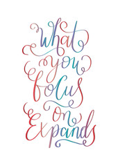 Hand Lettered What You Focus On Expand. Handwritten Inspirational Motivational Quotes. Hand Lettering Quote. Religious Quote. Design For Greeting Cards, Apparel, Prints, and Invitation Card.
