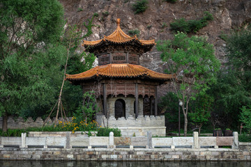 Chinese summer pavilion near the canal