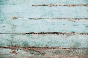 Obraz premium Vintage blue wood background texture with knots and nail holes. Old painted wood wall. Blue abstract background. Vintage wooden dark horizontal boards. Front view with copy space