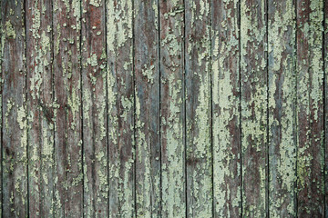 Vintage blue wood background texture with knots and nail holes. Old painted wood wall. Blue abstract background. Vintage wooden dark horizontal boards. Front view with copy space
