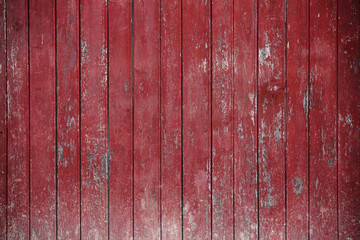 intage red wood background texture with knots and nail holes. Old painted wood wall. Red abstract background. Vintage wooden dark horizontal boards. Front view with copy space