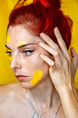 Girl with pink hair on a yellow background