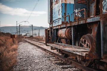 Selective focus shot of old abandoned locomotive