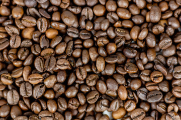 Detail of brown coffee beans seen from above
